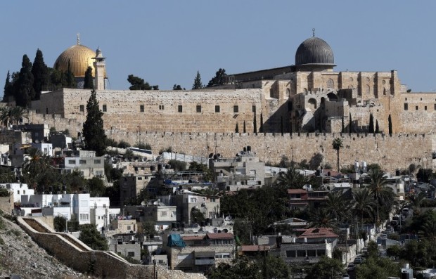 Christian pilgrims march through Jerusalem for Good Friday