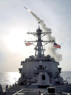 This US Navy handout photo released 23 March 2003 shows a US Navy Tomahawk Land Attack Missile (TLAM) being launched from the guided missile destroyer USS Winston S. Churchill, 23 March 2003, in the Mediterranean Sea. Winston S. Churchill is operating in the eastern Mediterranean Sea conducting missions in support of Operation Iraqi Freedom. AFP PHOTO/JAMES KROGMAN/US NAVY                                 / AFP PHOTO / US NAVY / JAMES KROGMAN