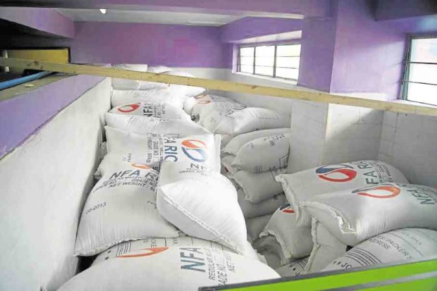 Some of the 400 sacks of rice intended for typhoon victims in Antique province but which were declared unfit for human consumption after these were not distributed. —ALBERT MAMORA JR / CONTRIBUTOR