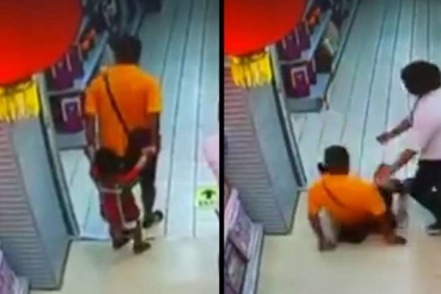 A Chinese boy died in a supermarket after his father accidentally fell on him. PHOTO: SCREENGRAB FROM GUANGDONG TV VIDEO