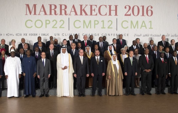 World leaders pose for a family photo at the UN World Climate Change Conference 2016 in Marrakesh on November 15, 2016. The US "must respect" the commitments made under President Barack Obama, his French counterpart Francois Hollande said at the UN climate summit held in the shadow of Donald Trump's victory.  / AFP PHOTO / FADEL SENNA