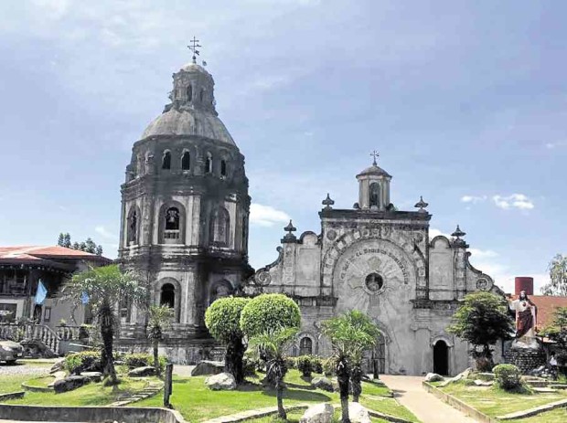 The leaning bell tower of San Guillermo Church in Bacolor town, Pampanga province, gets the needed attention from the government as a team starts assessing the structure’s strength. — TONETTE T. OREJAS