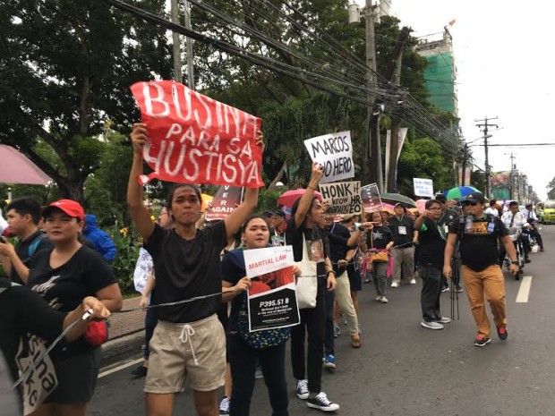 Anti-Marcos protesters in Bacolod City march on Nov. 30, 2016, against the burial of dictator Ferdinand Marcos at the Libingan ng mga Bayani. (PHOTO BY CARLA P. GOMEZ/ INQUIRER VISAYAS)