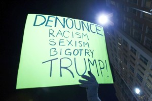 Denounce Trump sign during a protest in November 2016