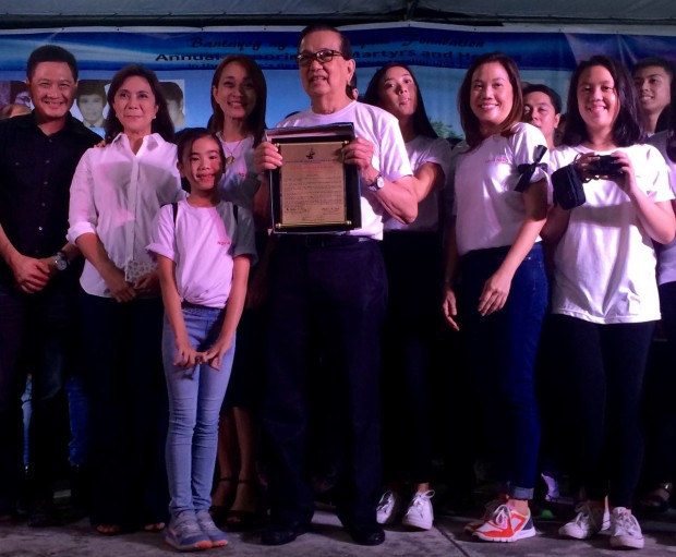 The family of the late editor-in-chief, Leticia Jimenez Magsanoc, receives the plaque recognizing her as a hero at the Bantayog ng mga Bayani.  Mrs. Magsanoc is specifically remembered for her courageous efforts in journalism to fight the Marcos dictatorship's censorship. (PHOTO BY LYN RILLON/ INQUIRER)