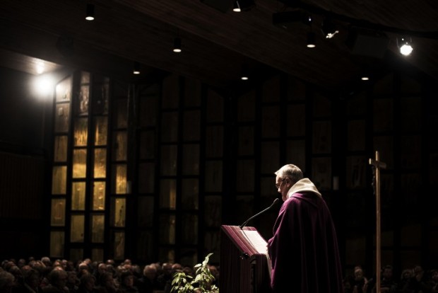Father Eric De Nattes leads a mass on November 7, 2016 in Sainte Foy les Lyon Saint Luc church, to pay to tribute to the victims who have been sexually abused by father Preynat. On November 7, 2016 in Sainte Foy les Lyon Saint Luc church, a mass was held to pay tribute to the victims who have been sexually abused by Father Preynat, suspect of having abused 70 scouts while in service. / AFP PHOTO / JEFF PACHOUD