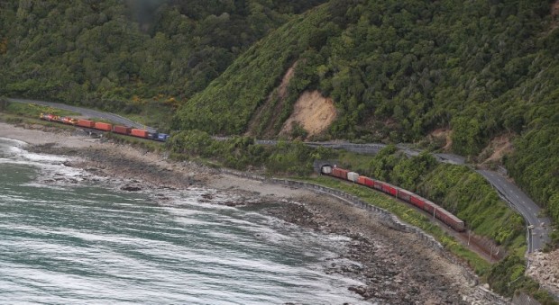 A photo taken and received on November 14, 2016, shows a freight train trapped by landslides near Kaikoura on the South Island's east coast. A powerful 7.8-magnitude earthquake killed two people and caused massive infrastructure damage in New Zealand, but officials said they were optimistic the death toll would not rise further. The jolt, one of the most powerful ever recorded in the quake-prone South Pacific nation, hit just after midnight near the South Island coastal town of Kaikoura. / AFP PHOTO / POOL / MARK MITCHELL
