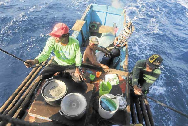 Fishermen use the stern as a dining area, bedroom and, sometimes, a bar. Photo by Rem Zamora/INQUIRER