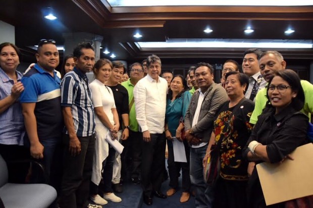 Senator Francis Pangilinan poses with representatives of coconut farmers' groups on Nov. 9, 2016, the day he reported to the Senate plenary the committee report on the coconut levy trust fund bill. (Photo courtesy of Senator Pangilinan's Senate office.)