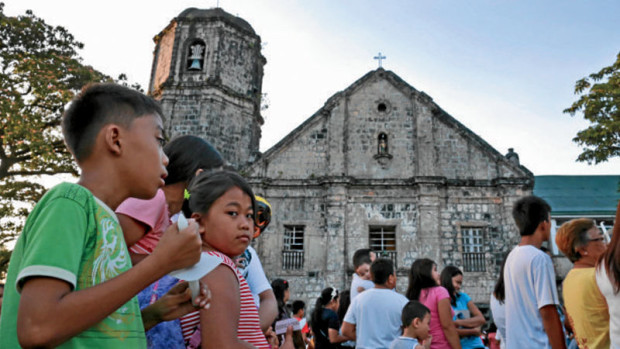 Bishop Joel Z. Baylon announced during Sunday Mass the ringing of church bells in Albay province every night at 9 p.m. as a signal to the faithful to pray for an end to extrajudicial killings in President Duterte’s war on drugs. The head of the Diocese of Legazpi announced his call for “Prayers at Nine” in a letter to Mr. Duterte that was read in 45 churches throughout the province a day after the President repeated his vow to execute drug addicts, In this file photo, Catholic devotees flock to a church in Camalig, Albay province. MARK ALVIC ESPLANA Inquirer Southern Luzon.