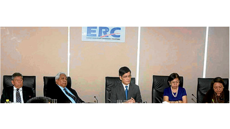 FACING PROBE Energy Regulatory Commission Chair Jose Vicente B. Salazar (center), shown in the agency’swebsite photowith Commissioners Geronimo D. Sta. Ana, Alfredo J. Non, Gloria Victoria C. Yap-Taruc and Josefina PatriciaM. Asirit, says only that he respected the President’s call for their resignation and that he would “definitely take the appropriate actions that would protect the organization.”