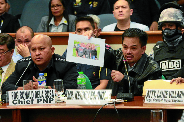 BAGUIO MEETING? Confessed drug lord Kerwin Espinosa shows to senators a photo of his supposed meeting with Sen. Leila de Lima in Baguio to inform her that Ronnie Dayan would deliver P2.3 million to her in Manila. —GRIG C. MONTEGRANDE