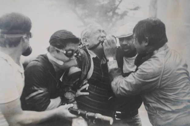 Senator Lorenzo Tañada wincing in pain after police used tear gas to disperse a rally at Welcome Rotunda on September 27, 1984. Photo courtesy of Lito Ocampo.