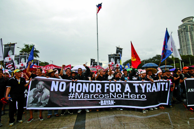 Satur Ocampo with anti-Marcos protesters arrive in Luneta Park, Manila for Black Friday protest against the recent burial of late President Ferdinand Marcos in Libingan ng mga Bayani.INQUIRER PHOTO / RICHARD A. REYES