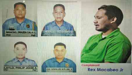 DISARMED AND RELIEVED  The four policemen accused of robbery and extortion  —Contributed photo