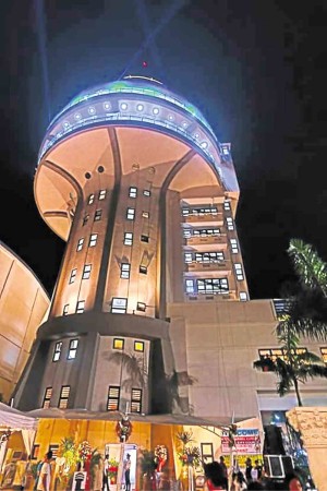 GLEAMING COMEBACK After a makeover that was first planned in 2006, the newly restored structure is  now brighter and one floor higher—but still keeping the mushroom shape that made it a Pasig icon in the 1970s  (lower photo). —PHOTOS FROM PASIG CITY PIO