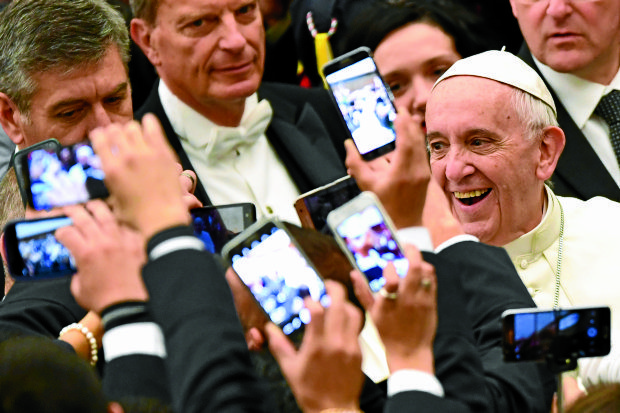 POPE FRANCIS Toast of socialmedia —AFP