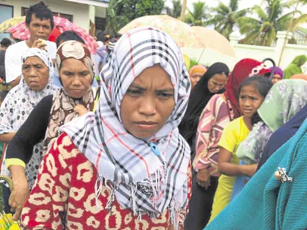 Clashes between government troops and Abu Sayyaf bandits in Al-Barka town in Basilan province bring fear and concern to displaced Yakan women and their families. —JULIE S. ALIPALA