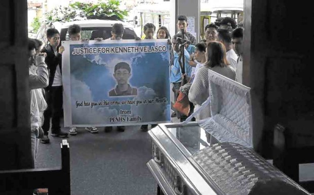 Relatives and classmates of Kenneth Velasco attend his burial in Baguio City. —EV ESPIRITU