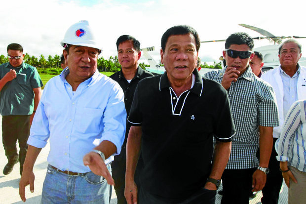 President Rodrigo Roa Duterte is welcomed by Albay Governor Al Francis Bichara upon his arrival at Legazpi City in Albay for the groundbreaking ceremony of the newBicol International Airport Terminal on December 8, 2016. ACE MORANDANTE/Presidential Photo