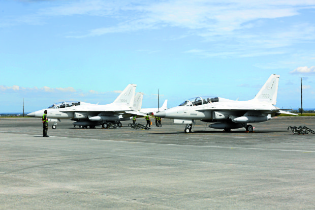 Supersonic fighter jets from South Korea land in Clark after flying in formation during Thursday’s ceremonial turnover. —PHOTO BYNIÑO JESUSORBETA