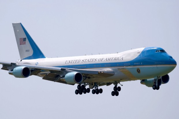 (FILES) Air Force One, Carrying US President Barack Obama arrives at Hangzhou Xiaoshan International Airport in Hangzhou on September 3, 2016. President-elect Donald Trump called Tuesday for the cancellation of a multi-billion dollar Boeing contract to build the next Air Force One, calling the ballooning costs "ridiculous.""Boeing is building a brand new 747 Air Force One for future presidents, but costs are out of control, more than $4 billion. Cancel order!" Trump tweeted Converting a pair of 747-8 jumbo jets to state-of-the-art luxury command centers by 2024 had been estimated to cost $3 billion when Boeing was picked for the job in January 2015. The legendary light blue and white liveried jets -- "The United States of America" emblazoned on the fuselage and an American flag on the tail -- are a powerful symbol of US might.  / AFP PHOTO / NICOLAS ASFOURI
