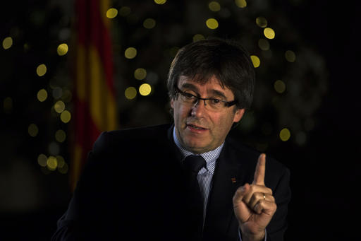 Catalonia's regional president, Carles Puigdemont speaks during an interview with The Associated Press in Barcelona, Spain, on Friday, Dec. 16, 2016. Puigdemont plans to go ahead with a new referendum on independence by September despite a ruling by Spain's Constitutional Court banning the vote. AP