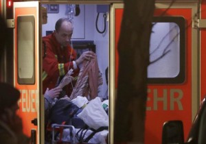 Firefighter attends to injured person in Berlin truck attack - 19 Dec 2016