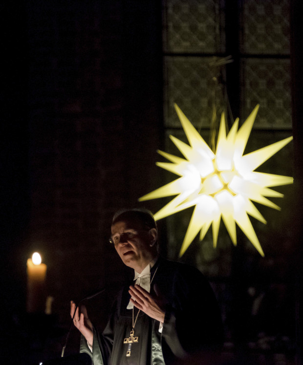 Regional bishop Ralf Meister leading the Christmas Eve service at the Marktkirche, also known as Market Church of Sts. George and James, in Hannover, Germany. (Peter Steffen/dpa via AP)