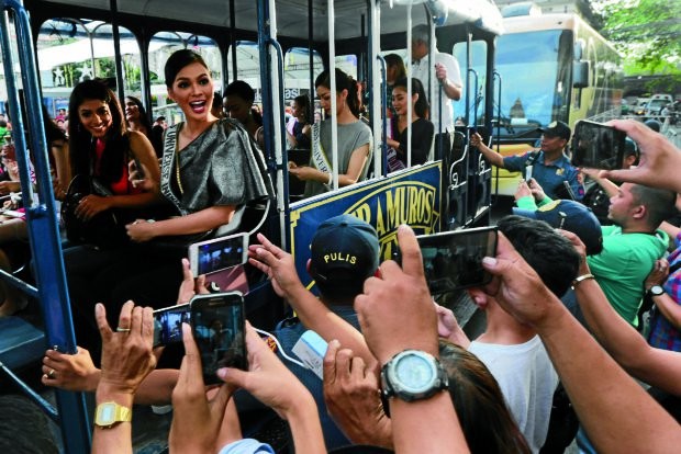 Miss Universe candidates tour the walled city of Intramuros, Manila, in a tramvia, on Dec. 12, 2016. (PHOTO BY GRIG C. MONTEGRANDE/ INQUIRER)