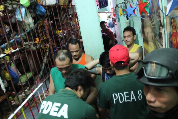 PDEA agents conduct body searches on the inmates of the Leyte Sub-Provincial Jail in Ormoc City, as the prisoners come out of their cells during a raid on Dec. 22, 2016. (PHOTO BY ROBERT DEJON/ INQUIRER VISAYAS) 