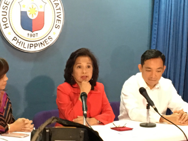 Pampanga Rep. Gloria Macapagal Arroyo holds answers questions from reporters during a congressional forum on Dec. 5, 2016.  With Arroyo are ACT Teachers Rep. Antonio Tinio (right) and Quezon 4th District Rep. Angelina Tan. (PHOTO BY VINCE NONATO / INQUIRER FILE PHOTO)