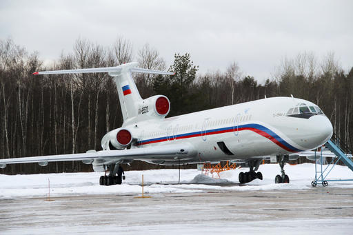 This photo taken on Thursday, Jan. 15, 2015 shows the Tu-154 plane with registration number RA-85572 at Chkalovsky military airport near Moscow, Russia. A Russian plane with 92 people aboard, including a well-known military band, crashed into the Black Sea on its way to Syria on Sunday, Dec. 25, 2016, minutes after takeoff from the resort city of Sochi, the Defense Ministry said. The Tu-154, the same plane shown in this photo, which belonged to the Defense Ministry, was taking the Alexandrov Ensemble to a concert at the Russian air base in Syria. (AP Photo/Dmitry Petrochenko)