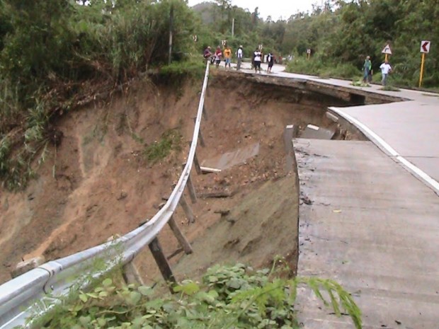 A portion of the 37-kilometer highway that connects Eastern Samar and Samar provinces collapses after heavy rains in the region. (PHOTO BY ROBERT DEJON/ INQUIRER VISAYAS)
