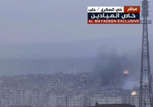 This frame grab from video provided by the Beirut-based pan-Arab satellite channel Al Mayadeen, which is close to the Syrian government, broadcast on Wednesday, Dec. 14, 2016, shows explosions followed by plumes of smoke, in East Aleppo, Syria. A cease-fire deal between rebels and the Syrian government in the city of Aleppo has effectively collapsed with fighter jets resuming their devastating air raids over the opposition's densely crowded enclave in the east of the city. The attacks threaten plans to evacuate the rebels and tens of thousands of civilians out of harm's way, in what would seal the opposition's surrender of the city. (Al Mayadeen TV, via AP)