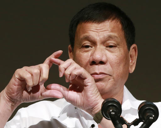 FILE - In this Oct. 26, 2016, file photo, Philippine President Rodrigo Duterte delivers a speech at the Philippine Economic Forum in Tokyo. Duterte, who has lashed out at U.S. President Barack Obama for criticizing his deadly crackdown on drugs, said his ties with the United States are likely to improve under Donald Trump, but that he is also excited to meet Russian leader Vladimir Putin at an upcoming Asia-Pacific summit. Duterte made upbeat remarks about both the president-elect and Putin at a news conference late Tuesday, Nov. 15, 2016 in Manila.  (AP Photo/Eugene Hoshiko, File)