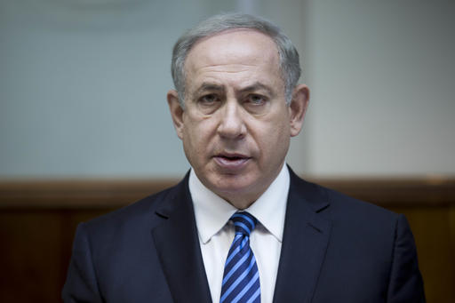 FILE - In this Dec. 11, 2016, file photo, Israeli Prime Minister Benjamin Netanyahu attends the weekly cabinet meeting at his office in Jerusalem. Netanyahu lashed out at President Barack Obama on Saturday, Dec. 24, accusing him of a "shameful ambush" at the United Nations over West Bank settlements and saying he is looking forward to working with his "friend" President-elect Donald Trump. Netanyahu's comments came a day after the United States broke with past practice and allowed the U.N. Security Council to condemn Israeli settlements in the West Bank and east Jerusalem as a "flagrant violation" of international law. (Abir Sultan, Pool via AP)