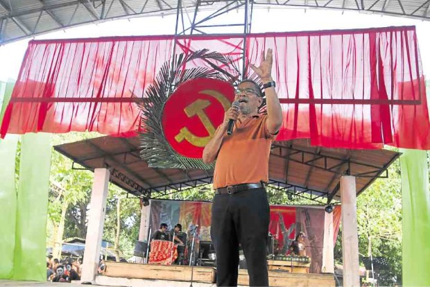 Interior Secretary Ismael Sueno speaks at the gathering of communist rebels, leftist leaders and peace advocates in a New People’s Army camp in Paquibato District in Davao City. —KARLOS MANLUPIG