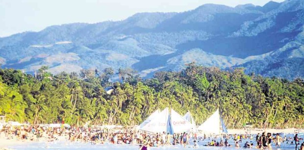 IT’S DARK IN PARADISE   Boracay Island, backdropped by the mountains of Malay town in Aklan province,  is suffering from daily power outages that disrupt business and burden residents and visitors in this top tourist destination.   —ARNOLD ALMACEN 