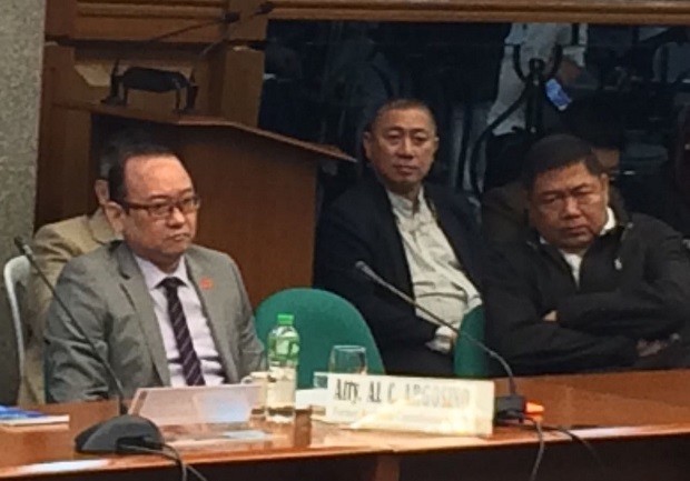 Former Immigration Associate Commissioner Al Argosino (left) attends the Senate hearing on the alleged P50-million bribery case of gambling operator Jack Lam. EDWIN BACASCMAS / PHILIPPINE DAILY INQUIRER