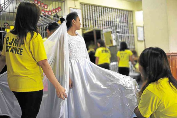 Four inmates of the Baguio City Jail Female Dormitory designed this bridal gown featured in a recent fashion show. —EV ESPIRITU