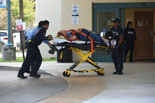 A shooting victim is taken into Broward Health Trauma Center in Fort Lauderdale, Fla., Friday, Jan. 6, 2017.  Authorities said multiple people have died after a lone suspect opened fire at the Ft. Lauderdale, Florida, international airport.  (Taimy Alvarez /South Florida Sun-Sentinel via AP)