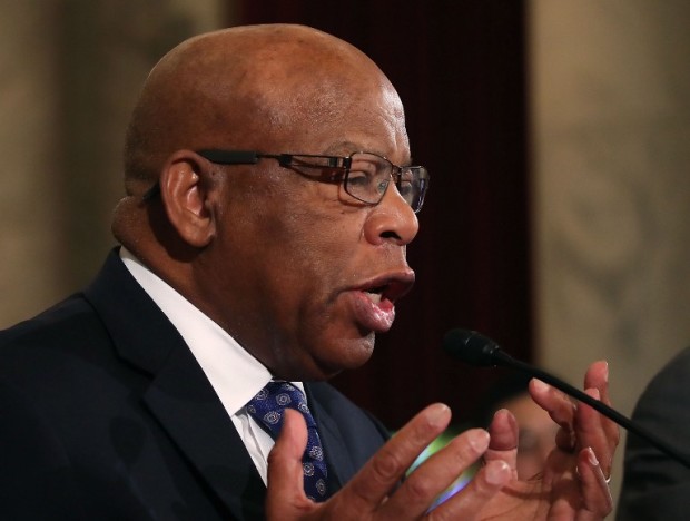 WASHINGTON, DC - JANUARY 11: Rep. John Lewis (D-GA), reads a statement speaking out against Attorney General nominee Jeff Sessions (R-AL), during a Senate Judiciary Committee hearing on Capitol Hill, January 11, 2017 in Washington, DC. The committee is on its second day of the Sessions confirmation hearing.   Mark Wilson/Getty Images/AFP