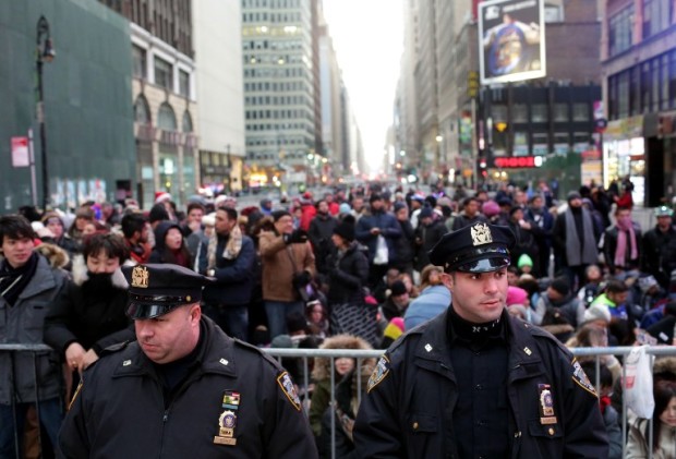 NEW YORK - DECEMBER 31: Police congregate in the lead-up to New Year's eve celebrations in Times Square in New York City on December 31, 2016.Security remains heightened as close to a million people are expected to crowd Times Square to watch the ball drop and ring in the New Year.   Yana Paskova/Getty Images/AFP