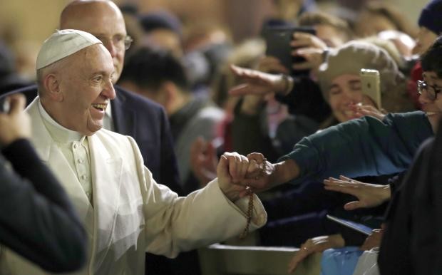 Pope Francis shakes hands after New Year's Eve Mass - 31 Dec 2016