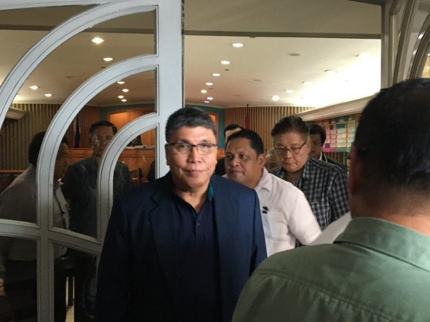 Surigao del Sur Rep. Prospero Pichay Jr. steps out of the Sandiganbayan on Jan. 17, 2017, after his arraignment for graft was postponed to March.  Pichay is being tried for a deal to use funds of the Local Water Utilities Administration in the purchase of a majority stake in the insolvent, Express Savings Bank Inc. (PHOTO BY VINCE NONATO / INQUIRER)