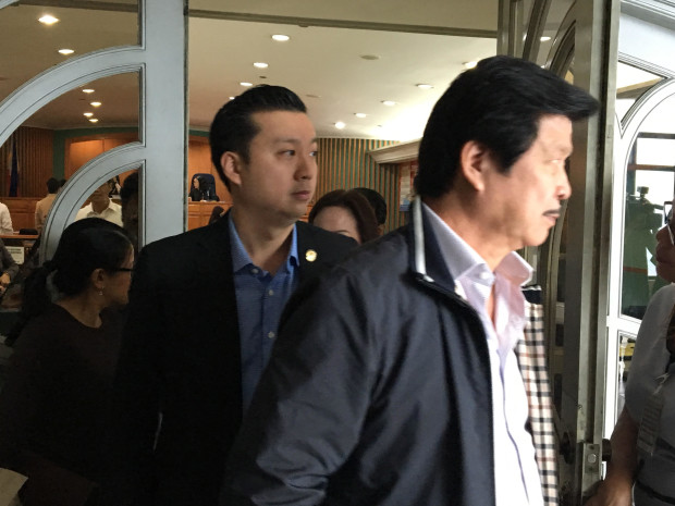 Valenzuela Rep. Weslie Gatchalian leaves the Sandiganbayan on Jan. 17, 2017, after his arraignment for graft was postponed until March.  Gatchalian is being tried for   the use of Local Water Utilities Administration funds in the purchase of the majority stake in the insolvent Express Savings Bank Inc. (PHOTO BY VINCE NONATO / INQUIRER)