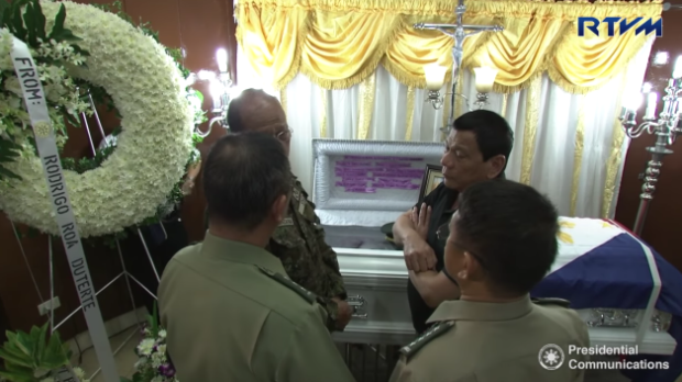 Duterte visits officer's wake
