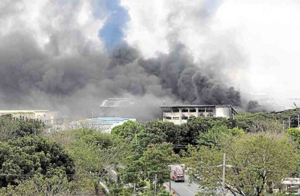 INFERNO The fire that hit a Japanese-owned factory in Cavite province is among the worst in the country's economic zones, according to an official of the Philippine Economic Zone Authority. —RICHARD REYES