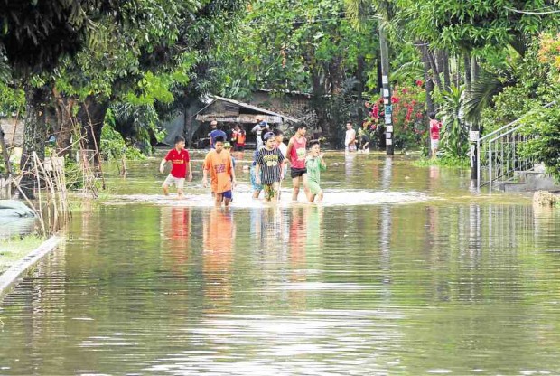 A section of Davao City’s Talomo District is flooded following heavy rain from Wednesday to Thursday. —BING GONZALES